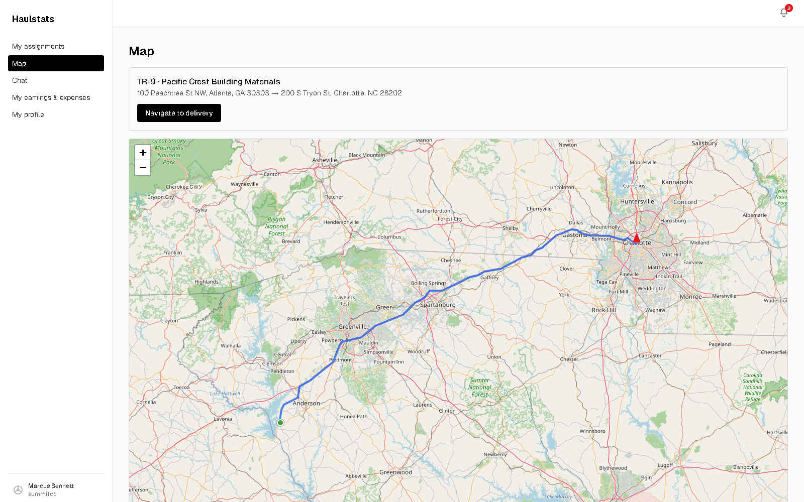 Haulstats live map showing a driver's current position and road route to the delivery address