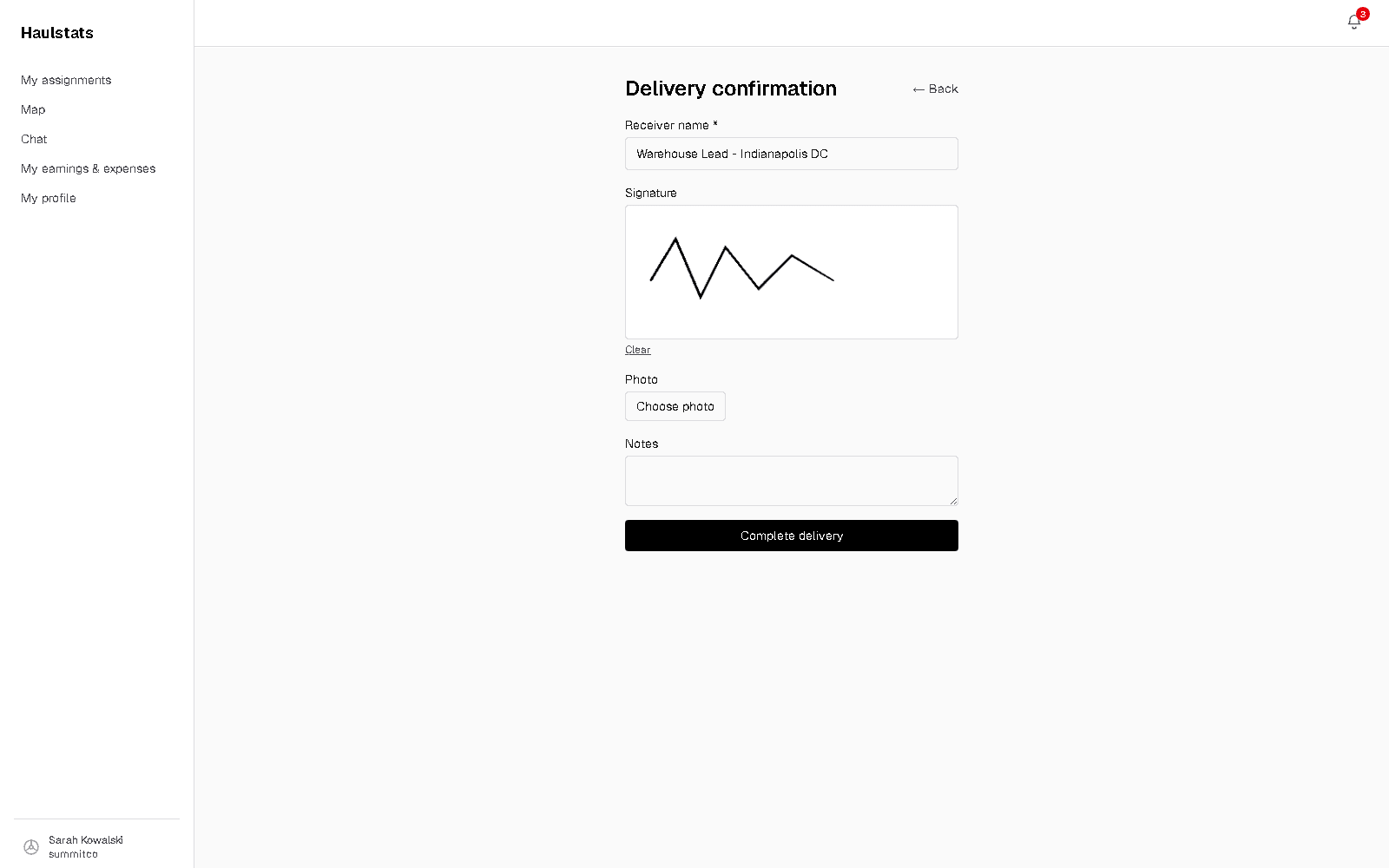 Haulstats driver proof-of-delivery screen with a signature captured on the phone and a photo attachment option